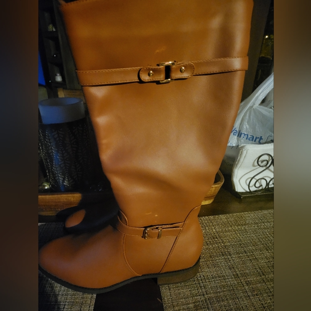 Boot with belted accent